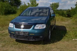    Volkswagen Touran 2005 , 310000 , 