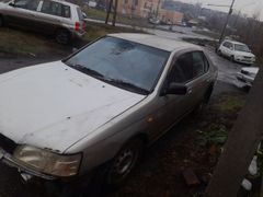 Седан Nissan Bluebird 1998 года, 119000 рублей, Новокузнецк