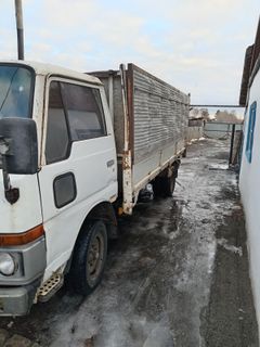 Бортовой грузовик Nissan Atlas 1989 года, 475000 рублей, Хабары