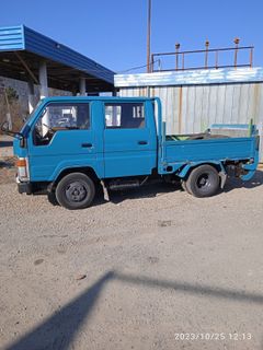 Бортовой грузовик Toyota Dyna 1989 года, 925000 рублей, Биробиджан