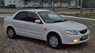 Седан Mazda Familia 2003 года, 560000 рублей, Томск