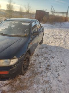 Седан Mazda Familia 1994 года, 195000 рублей, Тайшет