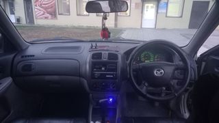 Седан Mazda 323 2002 года, 310000 рублей, Чаны