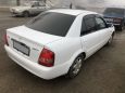  Mazda Familia 2002 , 217000 , 