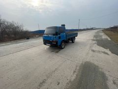 Бортовой грузовик Nissan Atlas 1987 года, 330000 рублей, Артём